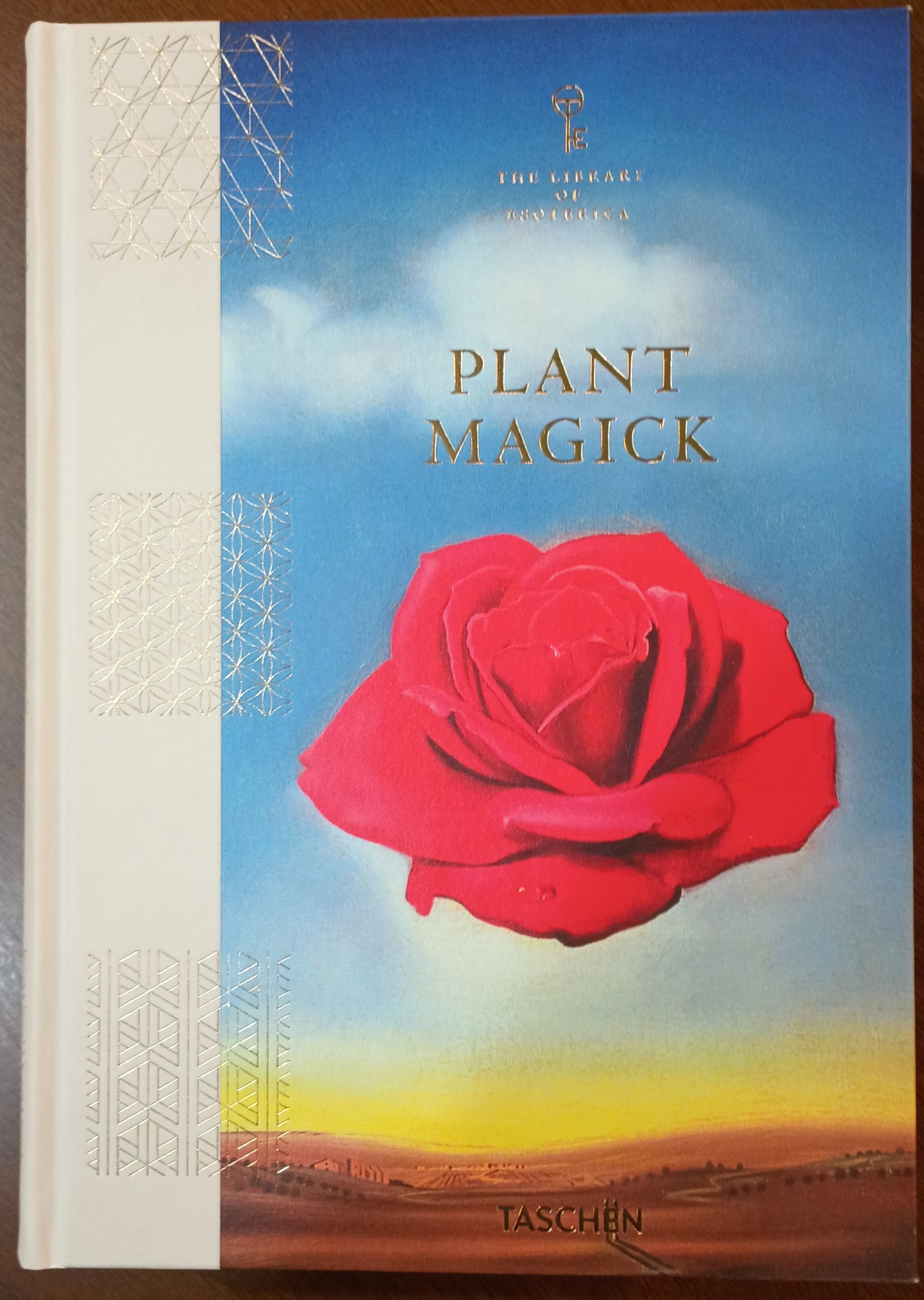 Cover of Plant Magic, Library of Esoterica, with red rose and title.