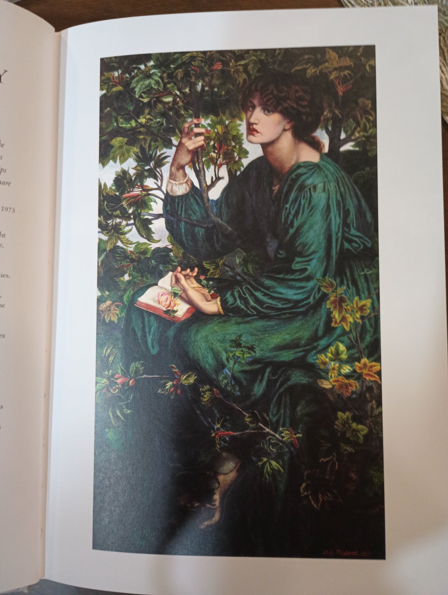 Page from Plant Magic, Library of Esoterica, of woman with plants.