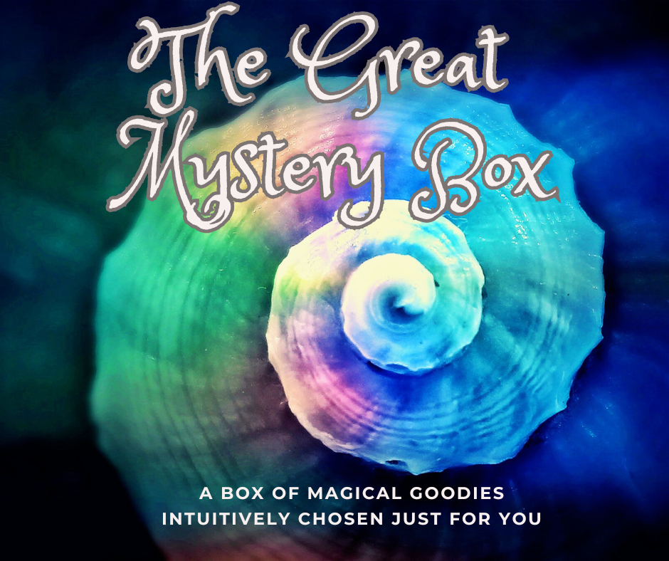 The Great Mystery Box: A box of magical goodies intuitively chosen just for you. Text written over a beautiful multicolored shell spiral.