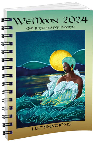We'Moon Spiral bound datebook for 2024 showing Destiney Powell's Wavelength (2020) of moon goddess emerging from the sea.