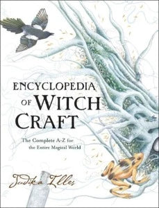Cover of Encyclopedia of Witchcraft; white cover with bird, frog, and root.