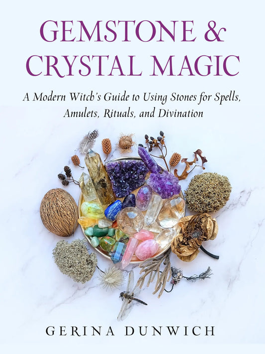 Cover of Gemstone & Crystal Magic showing a pile of stones, crystals, herbs, flowers, stems, and other natural things.